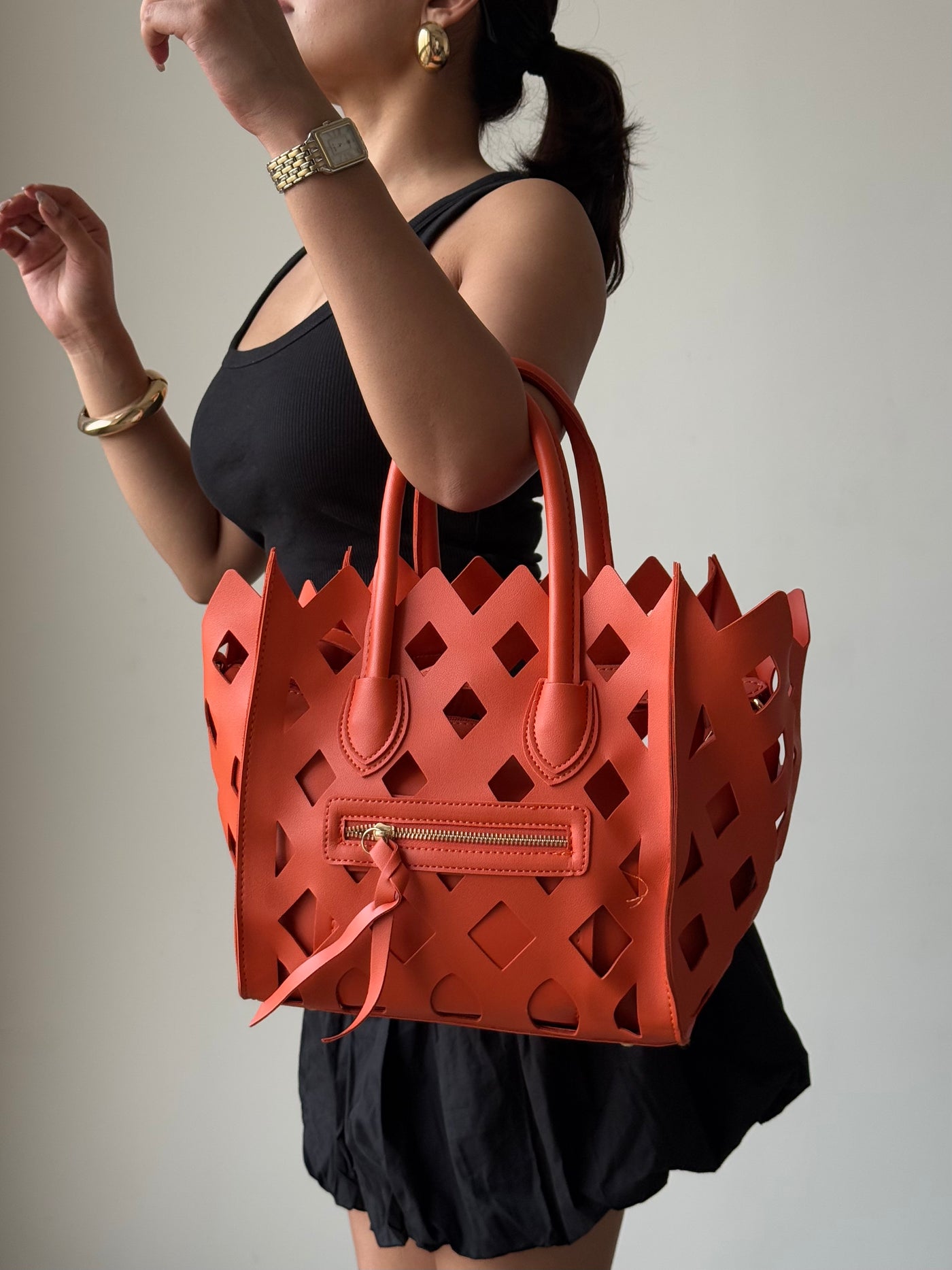 Contemporary Cut Out Hand Bag