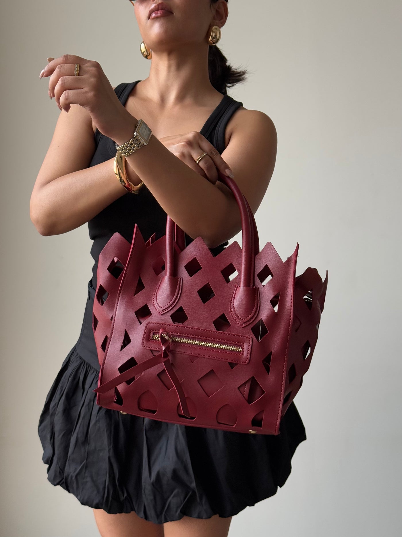 Contemporary Cut Out Hand Bag