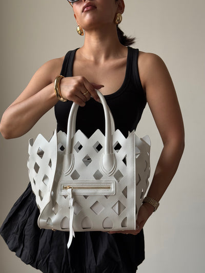 Contemporary Cut Out Hand Bag