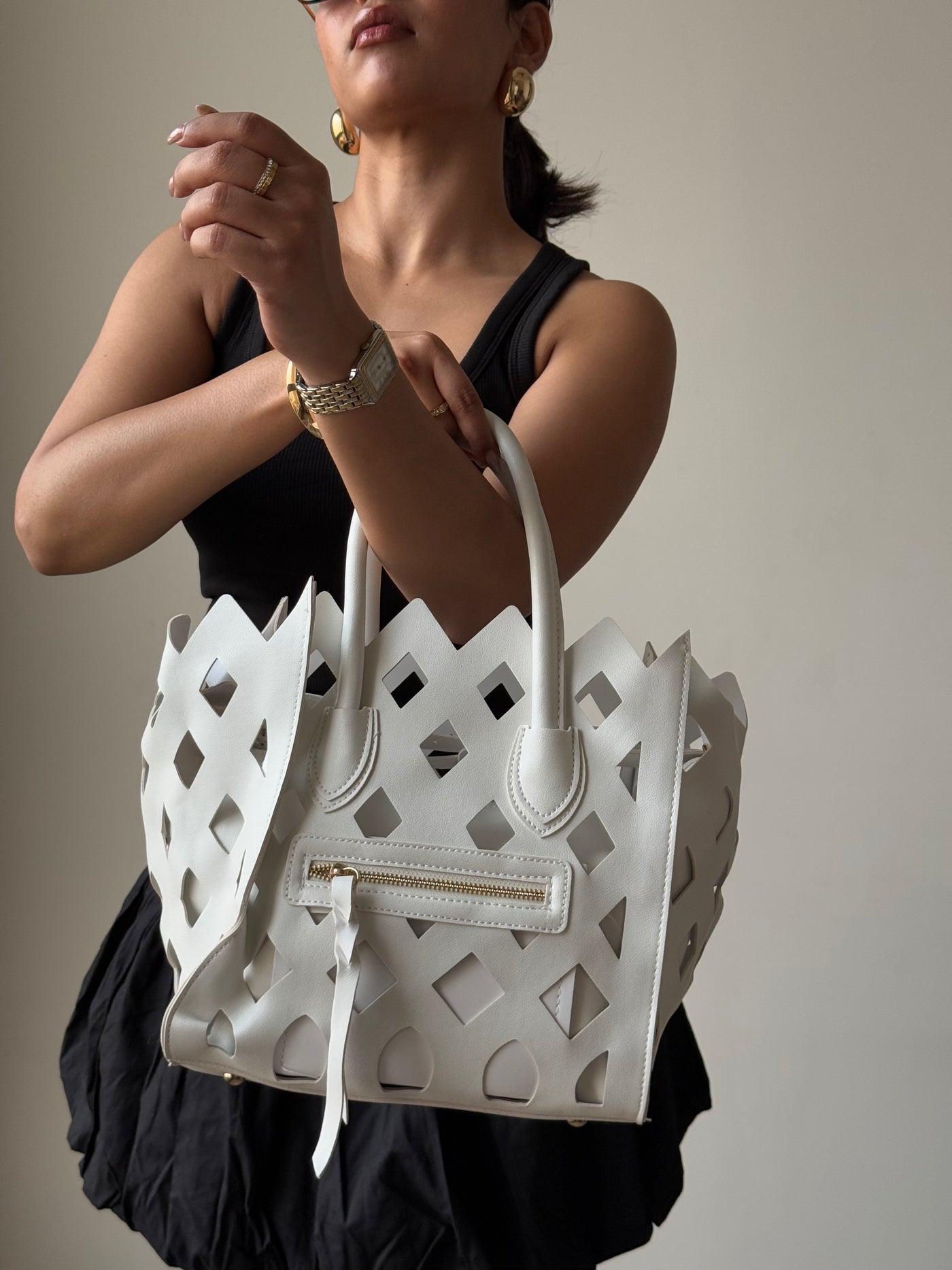 Contemporary Cut Out Hand Bag