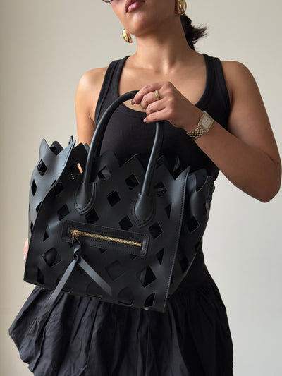 Contemporary Cut Out Hand Bag