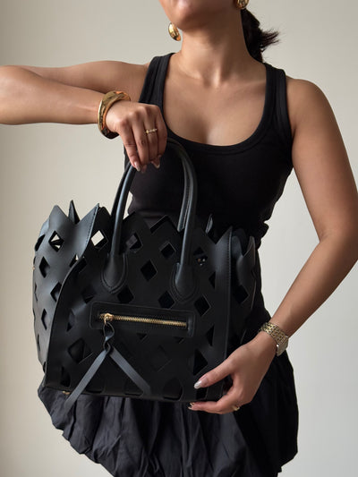 Contemporary Cut Out Hand Bag