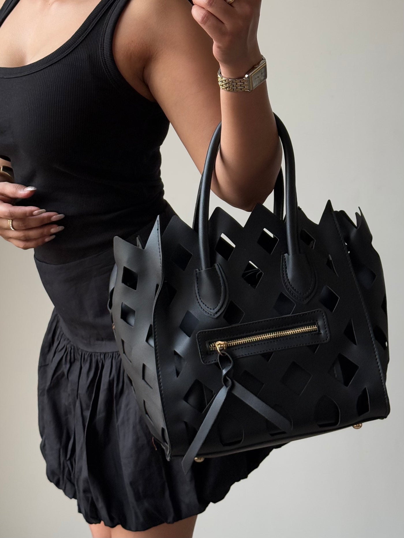 Contemporary Cut Out Hand Bag