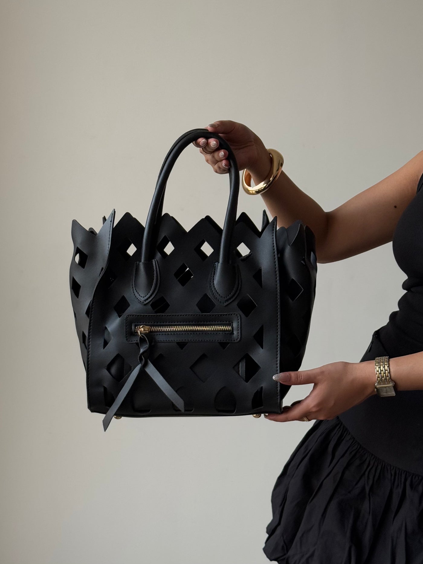 Contemporary Cut Out Hand Bag