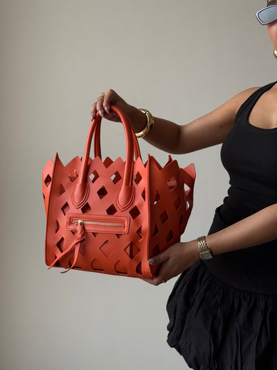 Contemporary Cut Out Hand Bag