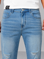 Blue Raw Cut Slim Bootcut Jeans
